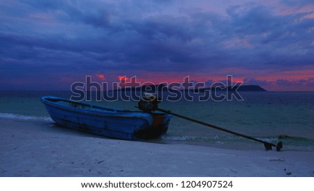 Small Boat and a dark Sunset at Koh Rong Island, Cambodia