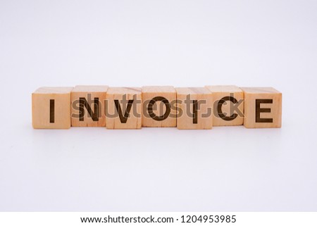 Invoice Word Written In Wooden Cube