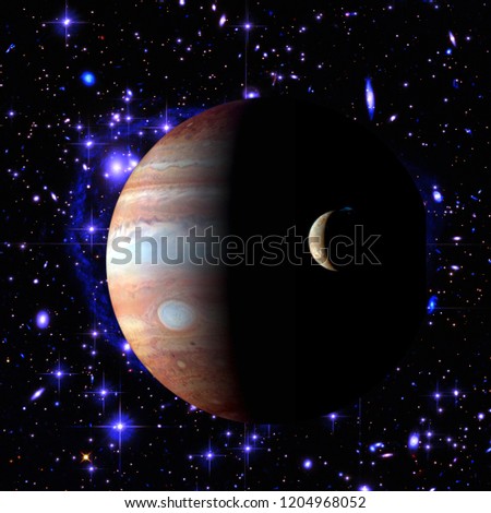 Jupiter and its moon. The elements of this image furnished by NASA.
