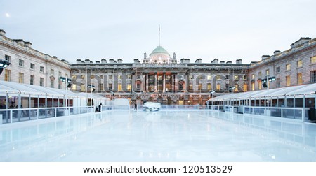 Night View of Somerset House ice rink in Strand, London. Royalty-Free Stock Photo #120513529