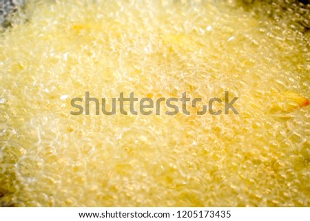 Oil boiling with bubble Royalty-Free Stock Photo #1205173435