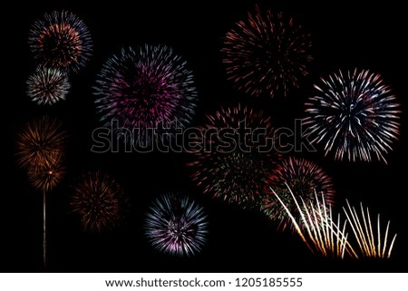 Festive fireworks colorful display isolated in bursting shapes on black background. Beautiful light for celebration. Show explosion happy new year wallpaper.