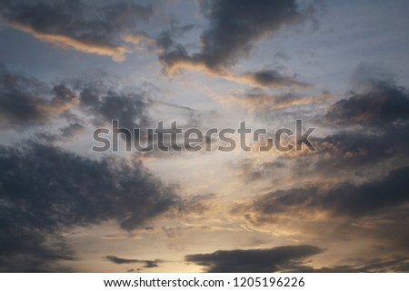 Abstract background of heavenly image. Fluffy clouds have built beautiful figures in the sky. The sun's rays illuminate the images of the sky with clouds.