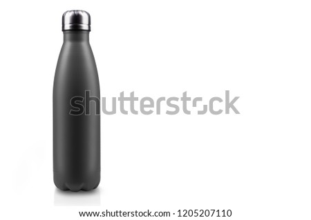 Black-matte, empty stainless thermo water bottle close-up isolated on white background. Studio photography Royalty-Free Stock Photo #1205207110