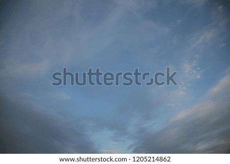 Natural light colored clouds and sky. Beautiful background of air space in the blue sky. The best image of heaven in the autumn clouds of natural background.