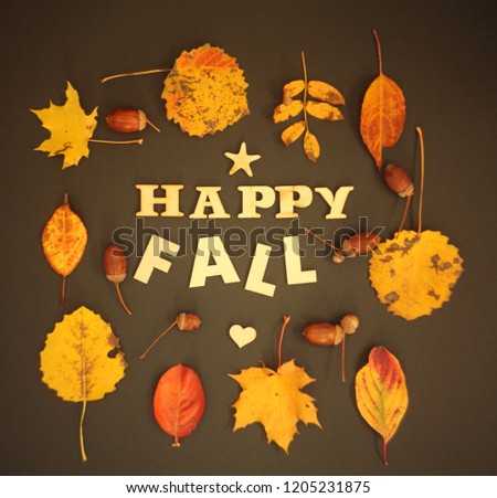 Happy fall Greeting Card wreath frame  with Text / Autumn  Leaves  and acorns Patter, soft focus