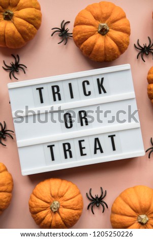 Trick or Treat halloween lightbox message with black scary bats