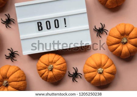 Boo halloween lightbox message with black scary bats