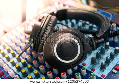 Headphones on encoders of musical mixer