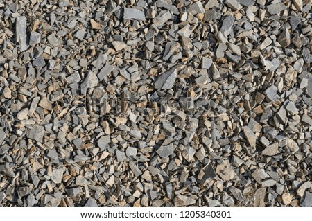 Texture of a dark yellow granite stone or background for design.
Surface of the rock with an abstract pattern.
