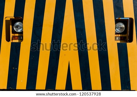 Black and yellow warning pattern, taken on a sunny day