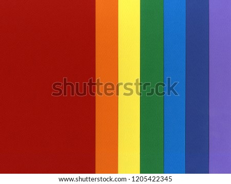 Colored pastel paper background.