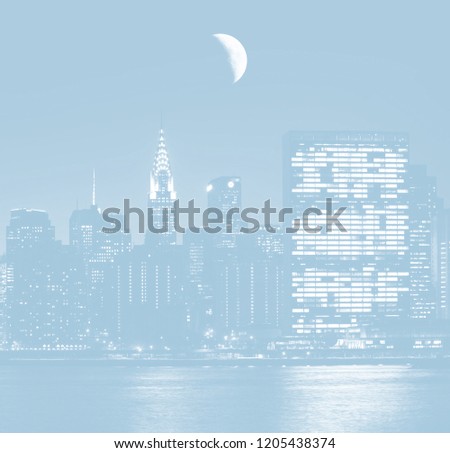 Light blue image of moon over Manhattan. New York City skyline