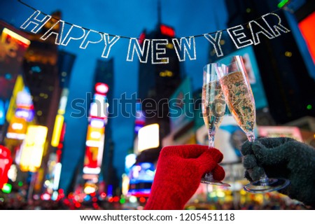 Happy New Year champagne toast couple in Times Square New York City