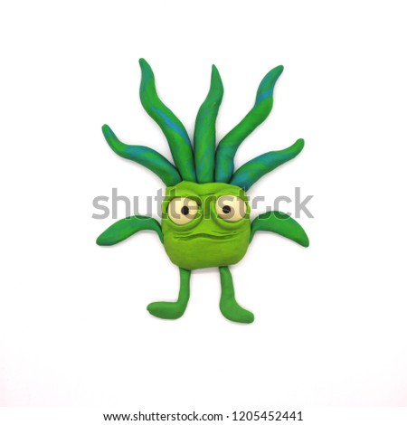 Plasticine plant monster on a white background Royalty-Free Stock Photo #1205452441