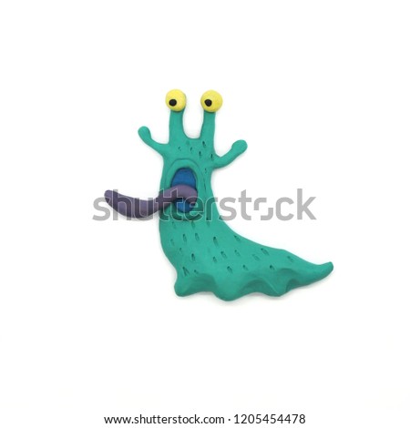Funny blue snail with a long protruding tongue. Plasticine illustration Royalty-Free Stock Photo #1205454478