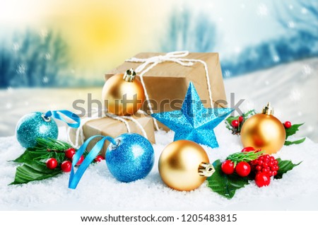 Christmas winter background with gifts, colored balls and star. Christmas background concept