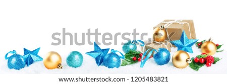 Christmas lantern with gifts, colored balls and stars on snow isolated background. Christmas background concept