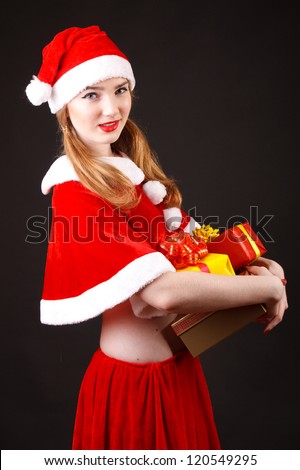 happy santa girl with gifts in their hands