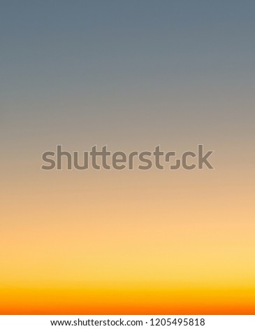 Concept of summer holidays, abstract blur sunset gradient sky background, blue and orange