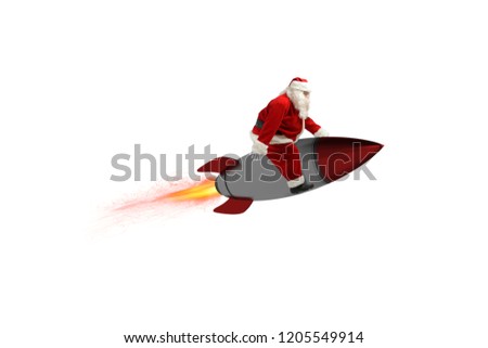 Fast delivery of Christmas gifts. Santa Claus ready to fly with a rocket isolated on white background