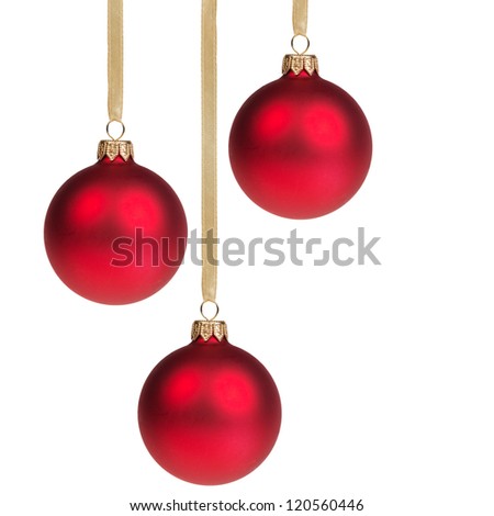 three christmas balls hanging on ribbon isolated on white Royalty-Free Stock Photo #120560446