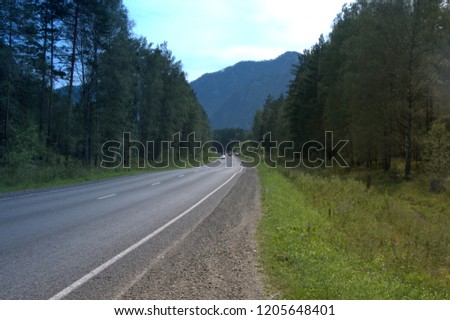 The Chuysky tract, the M-52 highway, an unusually beautiful road running along the mountain ranges in southern Siberia, connects Russia and Mongolia. The picture was taken in summer, with natural ligh