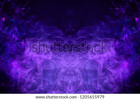 Fantasy print for clothes: t-shirts, sweatshirts. Purple and blue  cloud smoke  in the form of a skull, monster, dragon  on black  isolated background
