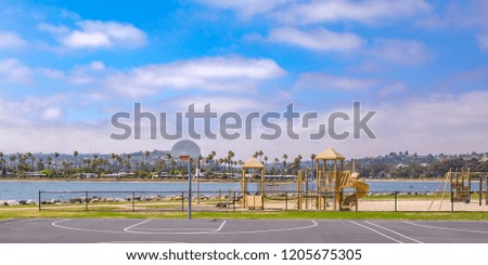 Basketball court in front of a lake in California