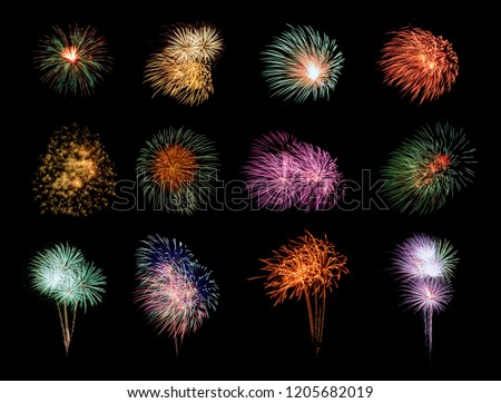 Twelve colorful fireworks on black background Royalty-Free Stock Photo #1205682019