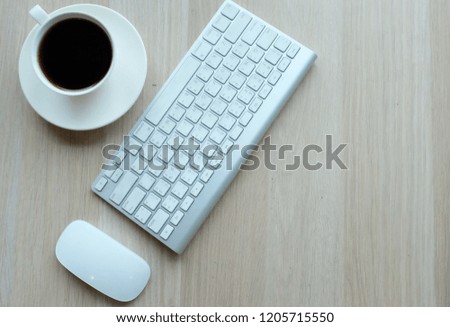 keyboard pen and  coffee cup glasses with copy space top view business concept background flat lay