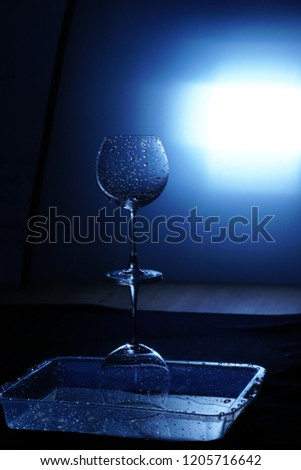 set up about light LED, blank wine glass and plastic tray for speed shutter station, photo workshop