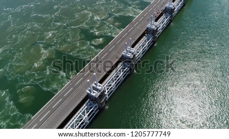 Aerial bird view photo of Eastern Scheldt storm surge barrier in dutch Oosterscheldekering is largest of Delta Works series of dams and barriers designed to protect Netherlands from flooding