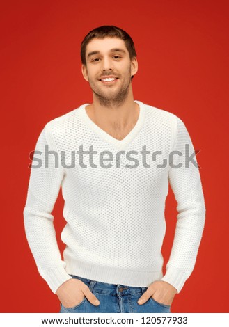 bright picture of handsome man in warm sweater.