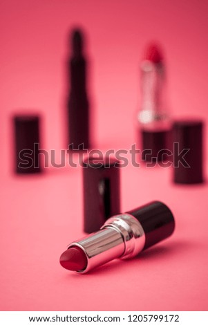 Matt lipsticks on pink background