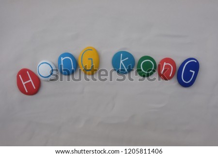 Hong Kong, souvenir with colored stones over white sand