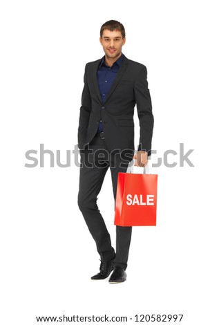 picture of handsome man in suit with shopping bags