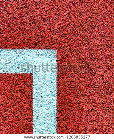 tennis court in close up, white line and red surface. close up bird view