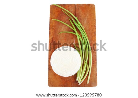 dairy products : feta white cheese on cut board isolated over white background
