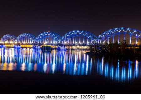 Railway bridge in Riga at night