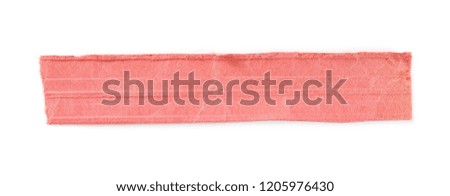 Red cardboard scrap isolated on white background, top view