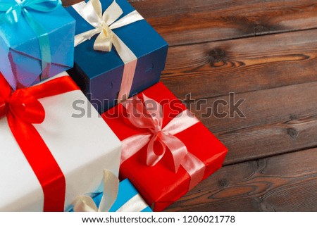 various gift boxes on wooden table, top view
