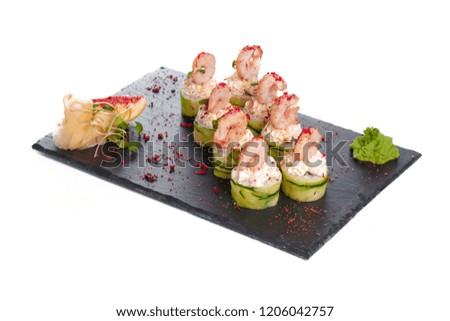 Black rectangle plate with sushi, isolated on white