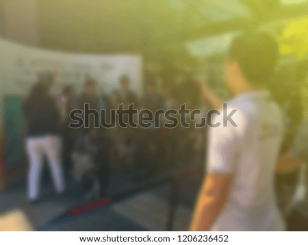 abstract blurry background of camera man with video camera