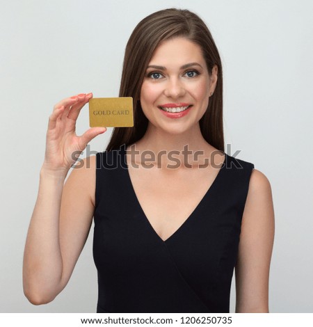Happy woman holding credit card on white background. Close up portrait.