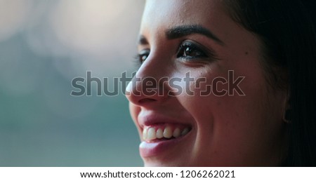 Close-up of hispanic latina beautiful young woman smiling in the sunlight