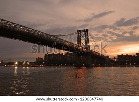 The bridge of manhattan. East River towards Brooklyn, New York.