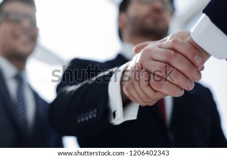 close up.handshake business people.