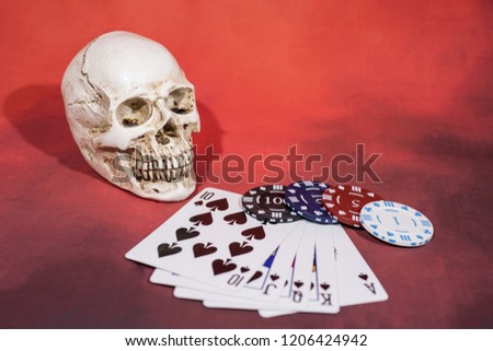 Casino abstract photo. Poker game on red background.  Theme of gambling.
