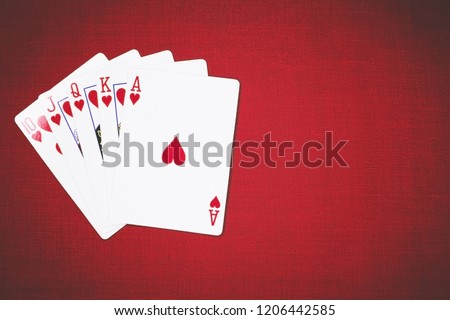 Poker Hands Royal Flush 3. Five playing cards - the poker royal flush hand. Royal Flash, card deck, poker royal flash on cards and poker chips on green casino table. success in gambling. soft focus Royalty-Free Stock Photo #1206442585